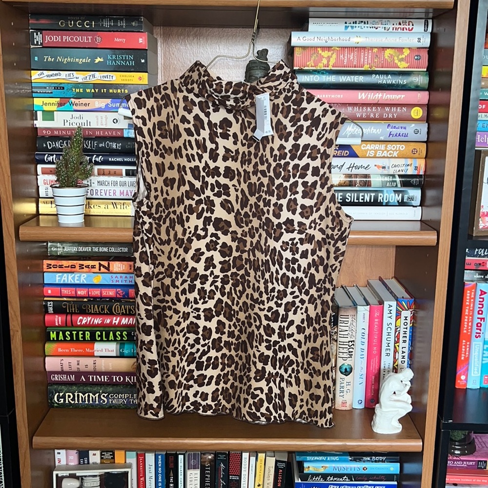 NWT Lovely Leopard Print High Neck sleeveless top.